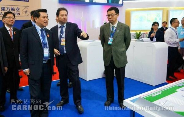 民航局長:民航推進軍民融合 促進兩翼齊飛376141_ 民航局長:民航推進軍民融合 促進兩翼齊飛